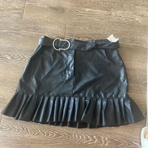 Faux leather skirt with pleated edges